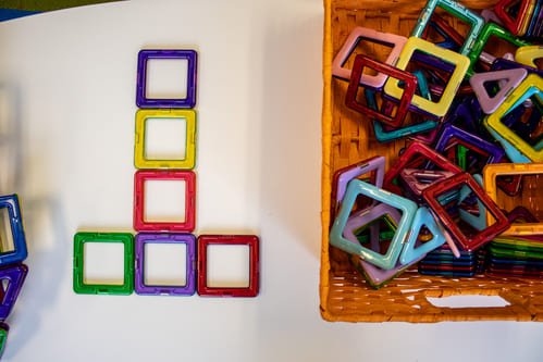 Square plastic puzzle pieces